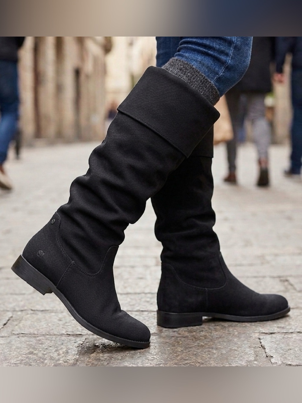 Steve Madden Balen black suede knee-high boots, featuring a relaxed slouch shaft